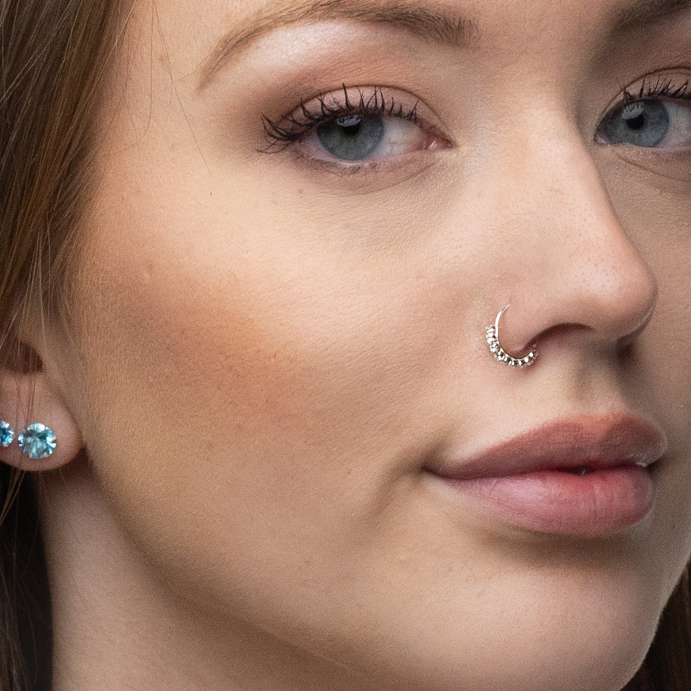 Silver Nose Ring, 9 clear Stones